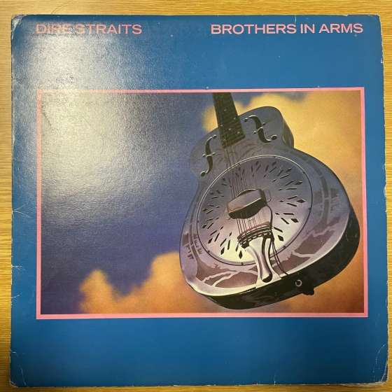 Dire Straits – Brothers In...